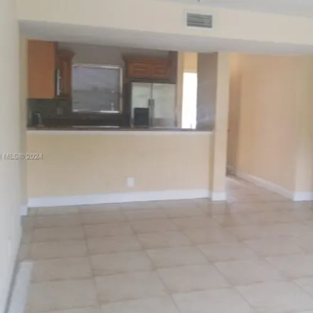 Rent this 3 bed condo on 1521 Windorah Way Apt C in West Palm Beach, Florida