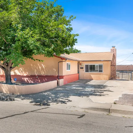 Buy this 4 bed house on 1513 Cornell Drive Southeast in Albuquerque, NM 87106