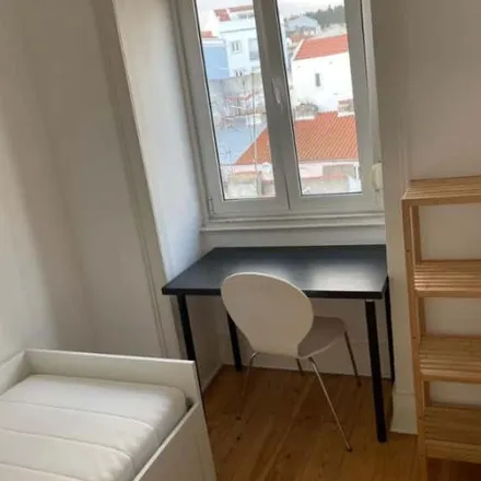 Rent this 2 bed room on Rua da Cascalheira in 1300-023 Lisbon, Portugal