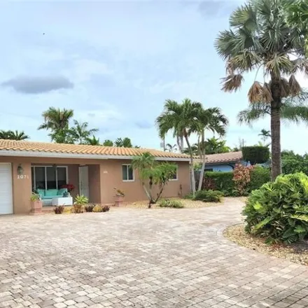 Buy this 3 bed house on 2047 Northeast 55th Street in Coral Ridge Isles, Fort Lauderdale