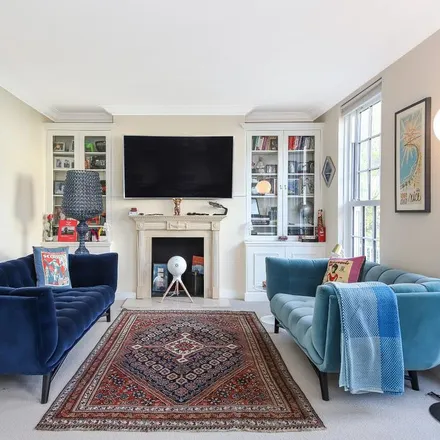 Rent this 5 bed townhouse on Barton Road in London, W14 9EF