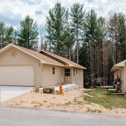 Buy this 2 bed house on 9752 Deer Track Court in Interlochen, Grand Traverse County