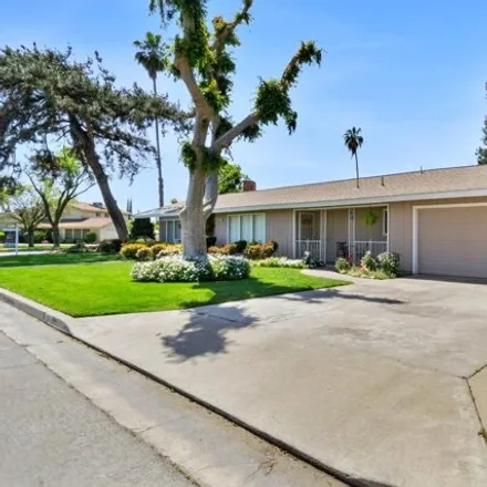 Buy this 4 bed house on 2353 West 3rd Street in Madera, CA 93637