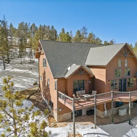 Buy this 4 bed house on Belle Meade Drive in Conifer, CO 80433
