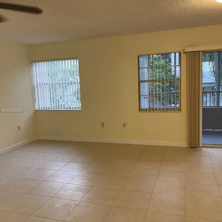 Rent this 2 bed apartment on 2755 North Oakland Forest Drive in Broward County, FL 33309