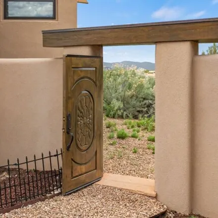 Buy this 3 bed house on 90 Paseo Aragon in Santa Fe County, NM 87506