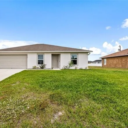 Buy this 3 bed house on 2767 Northeast 3rd Avenue in Cape Coral, FL 33909