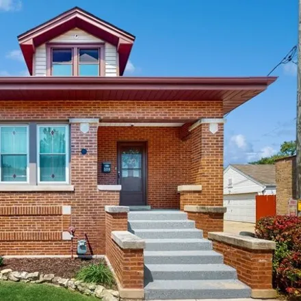 Buy this 3 bed house on 5014 West Cornelia Avenue in Chicago, IL 60634