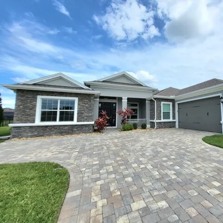 Rent this 4 bed house on 8341 Paragrass Ave in Melbourne, Florida