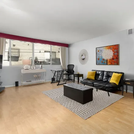 Buy this 2 bed condo on La Fayette Park Place in Los Angeles, CA 90057