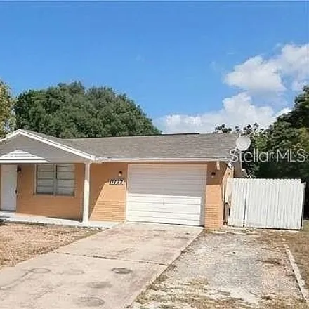 Rent this 3 bed house on 11732 Oceanside Drive in Bayonet Point, FL 34668
