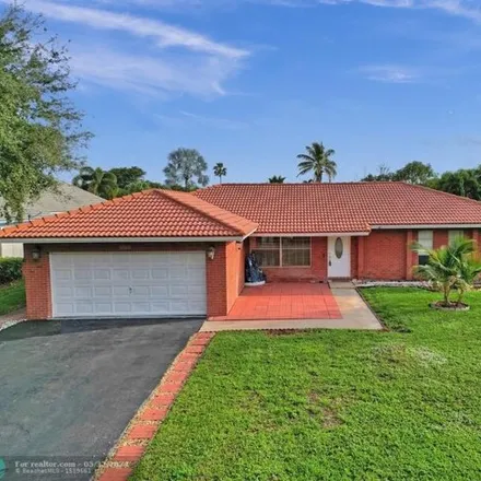 Buy this 4 bed house on 12128 Northwest 33rd Street in Coral Springs, FL 33065
