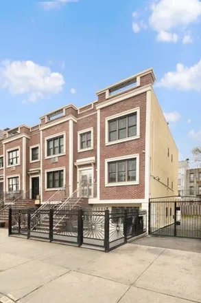 Buy this 5 bed townhouse on 112 Pulaski Street in New York, NY 11206