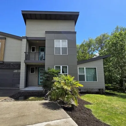 Buy this 5 bed house on 201 Northwest Quail Gardens Place in Hillsboro, OR 97124