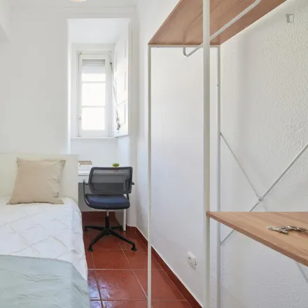 Rent this 4 bed room on Rua Actor Vale 29 in 1900-024 Lisbon, Portugal