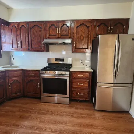 Rent this 4 bed apartment on 103-39 118th Street in New York, NY 11419