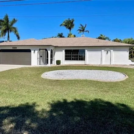 Rent this 4 bed house on 868 El Dorado Parkway West in Cape Coral, FL 33914