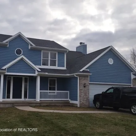 Buy this 4 bed house on 6558 Brassie Shot Road in Bath Charter Township, MI 48823