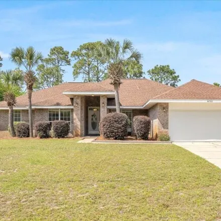 Buy this 4 bed house on 6751 Leisure Street in Navarre, FL 32566