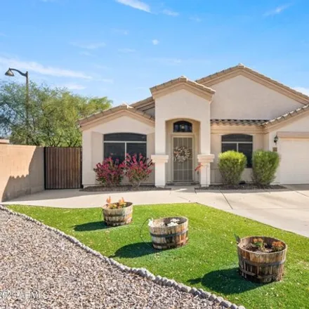 Buy this 4 bed house on 42735 West Honeycutt Road in Maricopa, AZ 85138