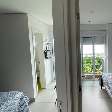 Rent this 2 bed apartment on Guarujá