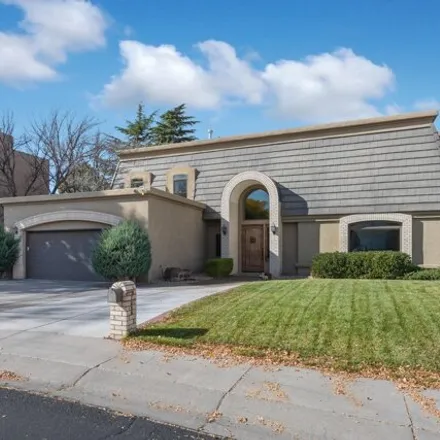 Buy this 4 bed house on 7089 Pala Mesa Court Northeast in Albuquerque, NM 87111
