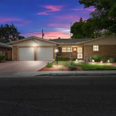 Buy this 3 bed house on 3222 Lykes Drive Northeast in Albuquerque, NM 87110