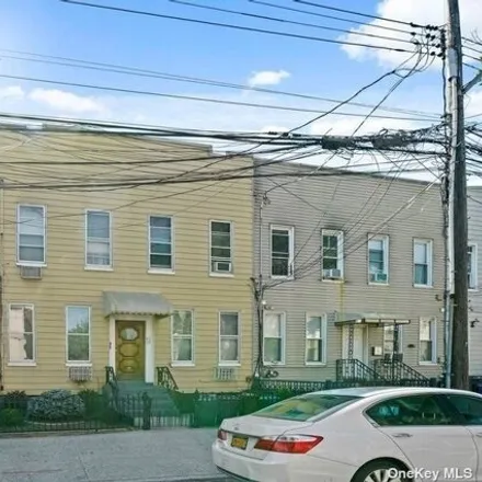 Buy this 8 bed house on 88-34 85th Street in New York, NY 11421