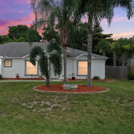 Buy this 3 bed house on 1908 Southwest Cranberry Street in Port Saint Lucie, FL 34953