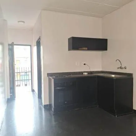 Rent this 2 bed apartment on Caltex in Commissioner Street, Johannesburg Ward 124