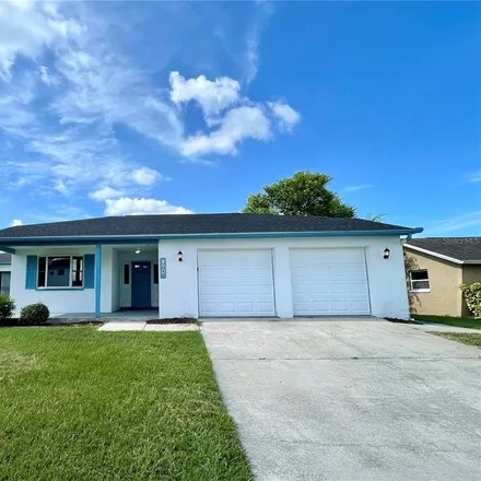 Rent this 4 bed house on 7010 Southwind Drive in Hudson, FL 34667