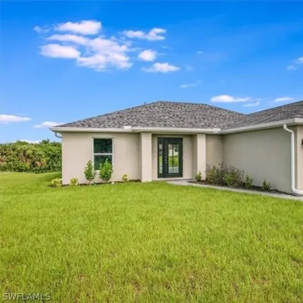 Buy this 4 bed house on 3627 NE 12th Ct in Cape Coral, Florida