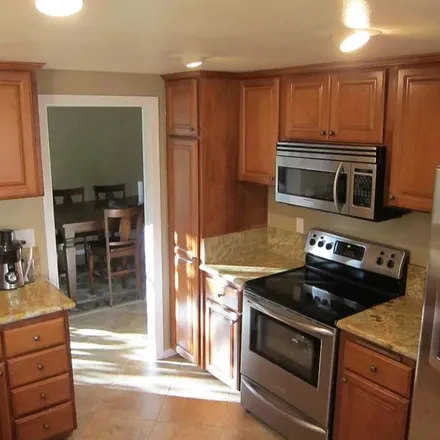 Rent this 3 bed apartment on 40526 Clover Lane in Palm Desert, CA 92260