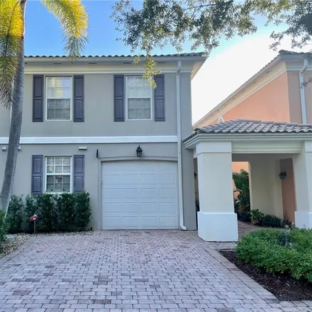 Rent this 3 bed townhouse on 5715 Cove Circle in Collier County, FL 34119