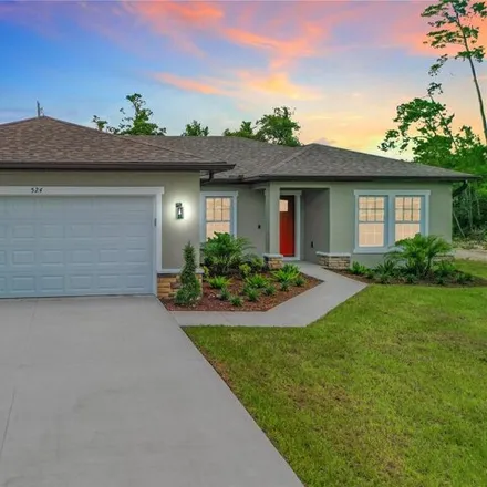 Buy this 3 bed house on 524 Marion Oaks Blvd in Ocala, Florida