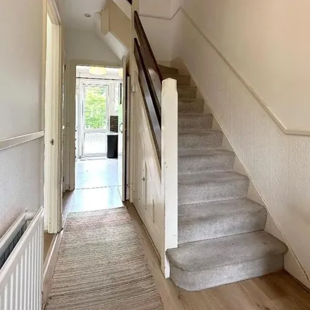 Rent this 3 bed apartment on 117 Shaldon Drive in London, SM4 4BQ