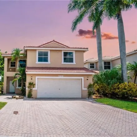 Buy this 5 bed house on 5600 Northwest 122nd Terrace in Heron Bay South, Coral Springs