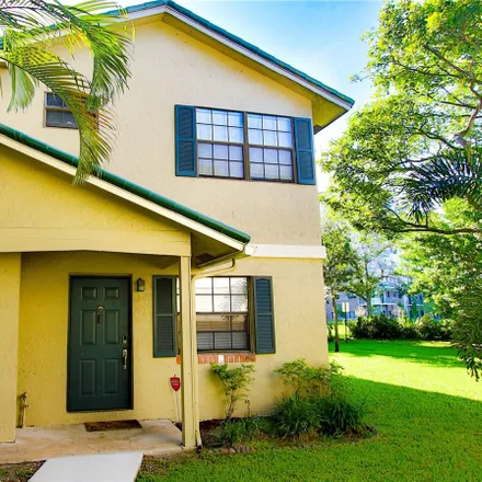 Rent this 3 bed townhouse on Northwest 82nd Avenue in Plantation, FL 33324