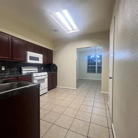 Rent this 5 bed apartment on 1694 Cold River Drive in Harris County, TX 77396