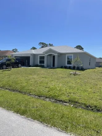 Rent this 3 bed house on 904 Wheatley Street Southeast in Palm Bay, FL 32909