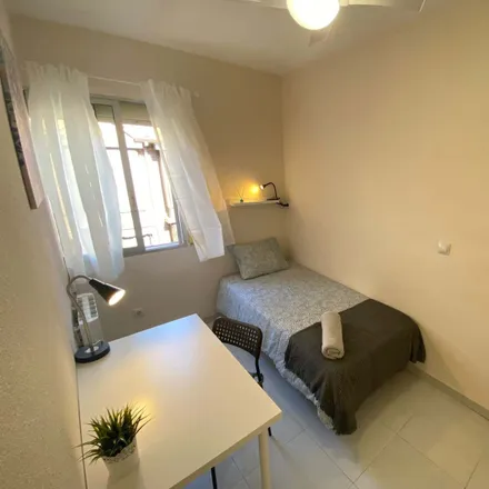Rent this 4 bed room on Calle del Discóbolo in 28022 Madrid, Spain