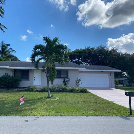 Rent this 3 bed house on 1602 Southwest 2nd Avenue in Lyons Park, Pompano Beach