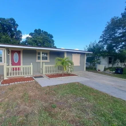 Buy this 4 bed house on 2621 Coral Avenue in Kissimmee, FL 34741