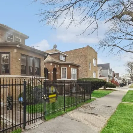 Buy this 4 bed house on 4875 West Bloomingdale Avenue in Chicago, IL 60639