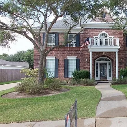 Rent this 4 bed house on 1643 Greenleaf Oaks Drive in Sugar Land, TX 77479