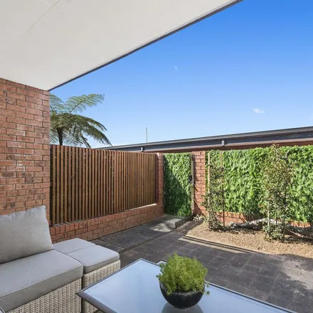 Rent this 2 bed townhouse on Azure in Kurrawyba Avenue, Terrigal NSW 2260