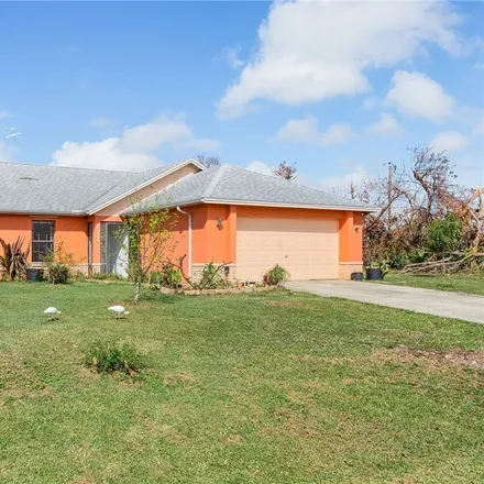 Buy this 3 bed house on 122 Northeast 20th Court in Cape Coral, FL 33909