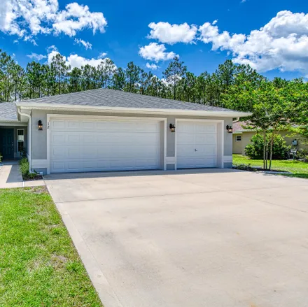 Buy this 3 bed house on 12 Karanda Place in Palm Coast, FL 32164