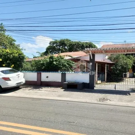 Buy this 2 bed house on Avenida Luiz Boiteux Piazza in Ponta das Canas, Florianópolis - SC