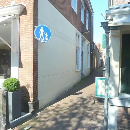 Rent this 2 bed apartment on De Vergulde Pauw in Papenstraat, 2611 ET Delft